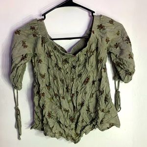 I’m selling a medium green flower shirt from rue 21 needs a new home:))